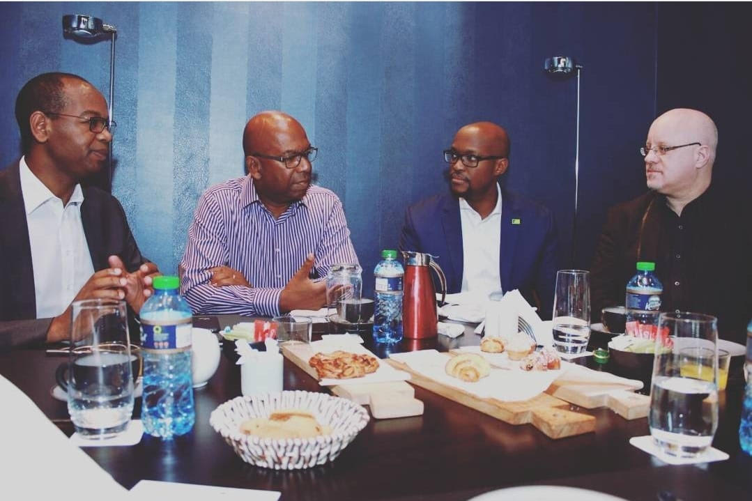 Eddie Ndichu (3rd from left) with the late Safaricom CEO Bob Collymore & Immediate former KCB CEO Joshua Oigara at the time of Fuliza’s inception. 