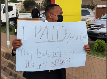 Benji Ndolo takes feud with popular car dealer to the streets