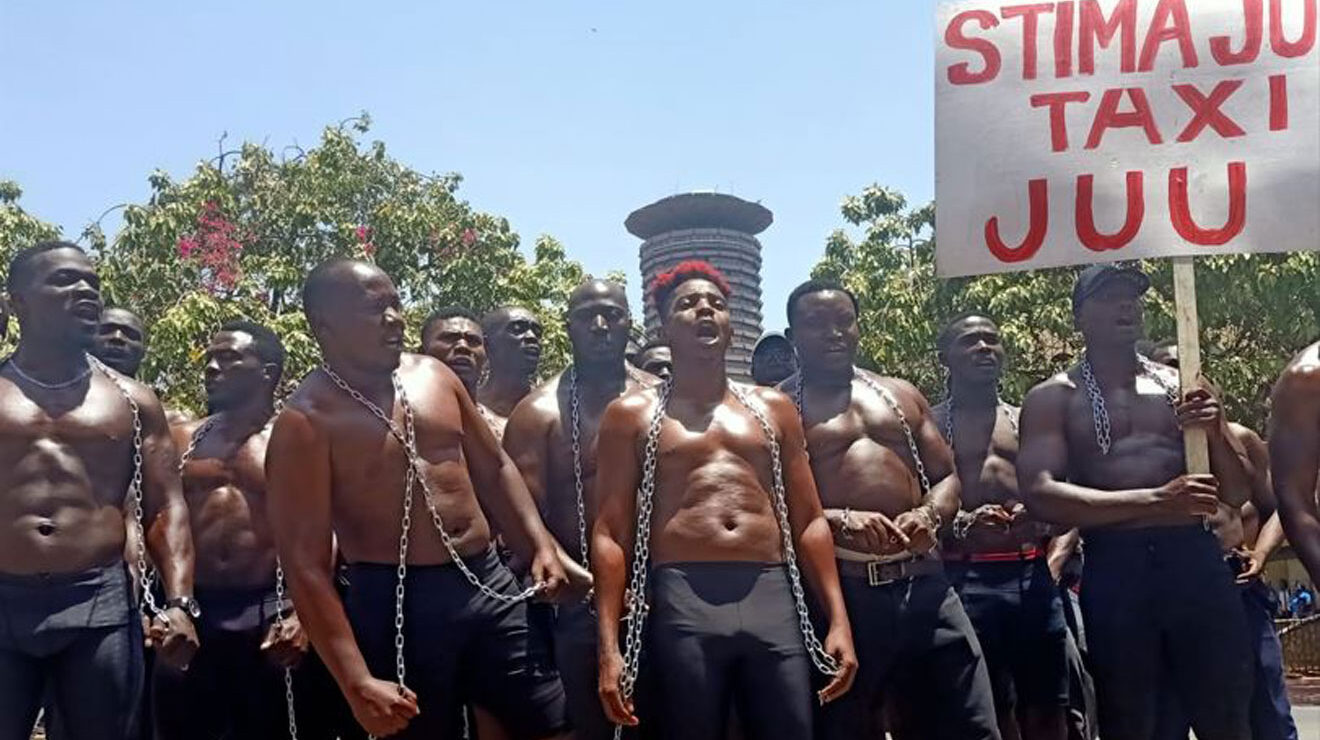 Comedian Eric Omondi and other protesters outside Parliament Buildings on February 21, 2023