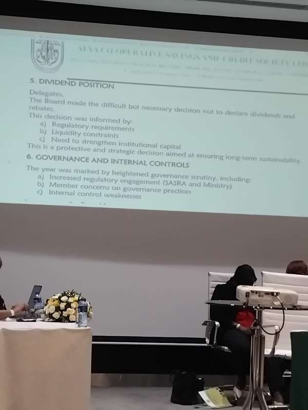 Afya SACCO delegates’ meeting presentation slide showing dividend position and governance notes, indicating no dividends or rebates were declared due to regulatory requirements, liquidity constraints, and the need to strengthen institutional capital, alongside references to heightened regulatory engagement and internal control weaknesses.