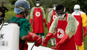 Red Cross workers in Uganda disinfect equipment during an Ebola response exercise